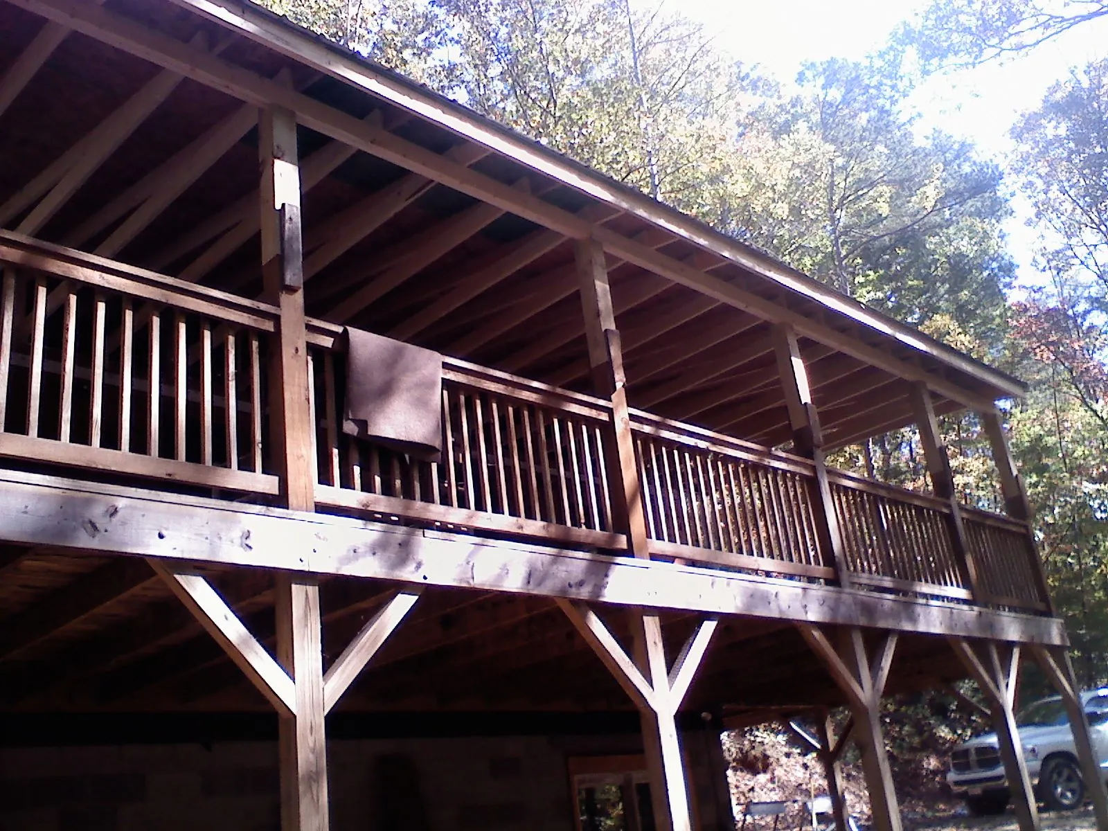 Timber framing under a new elevated porch and deck — Roof Leak Repair in Ellicott City by Roofing Brothers